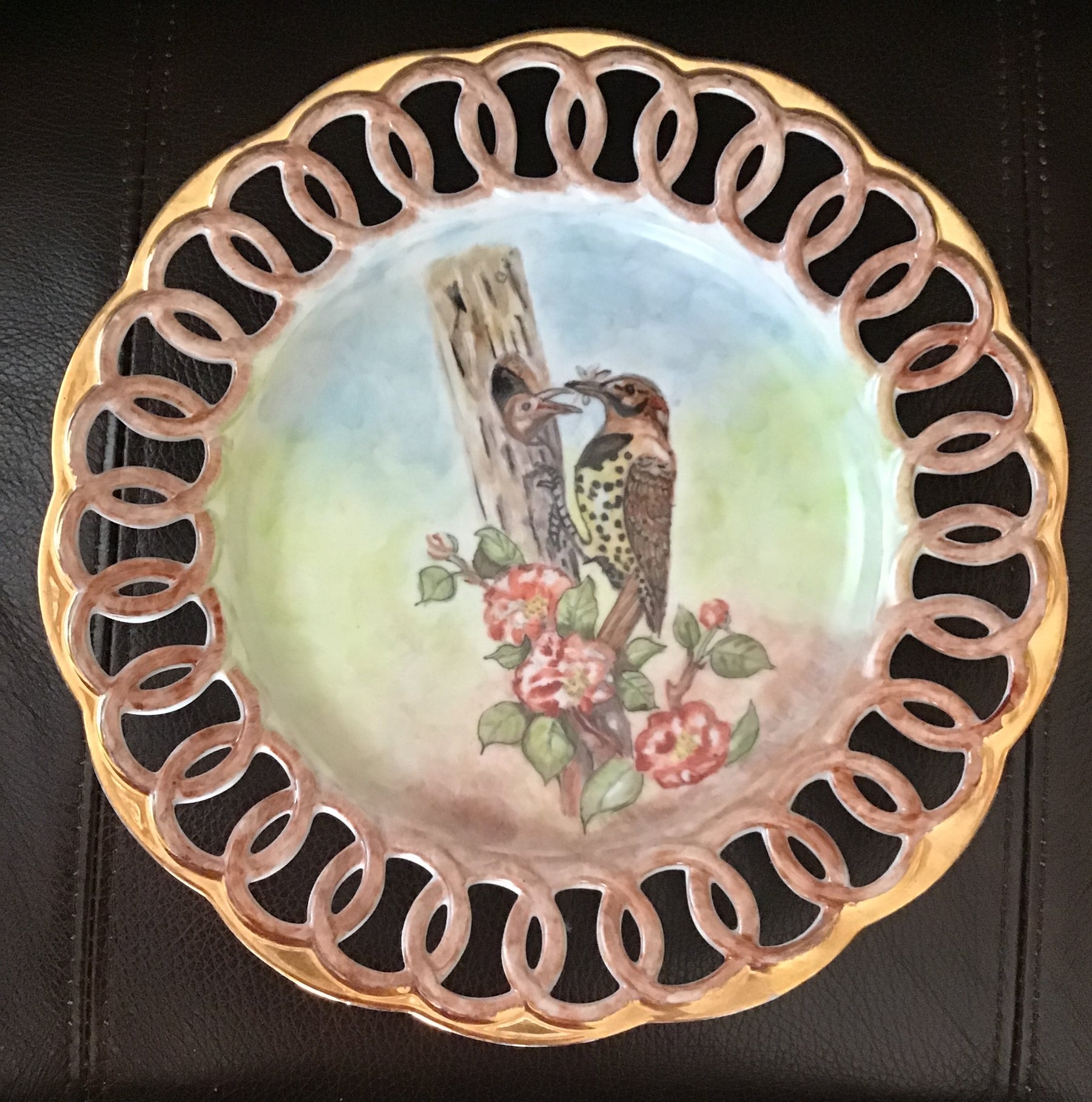 Birds on openwork plate