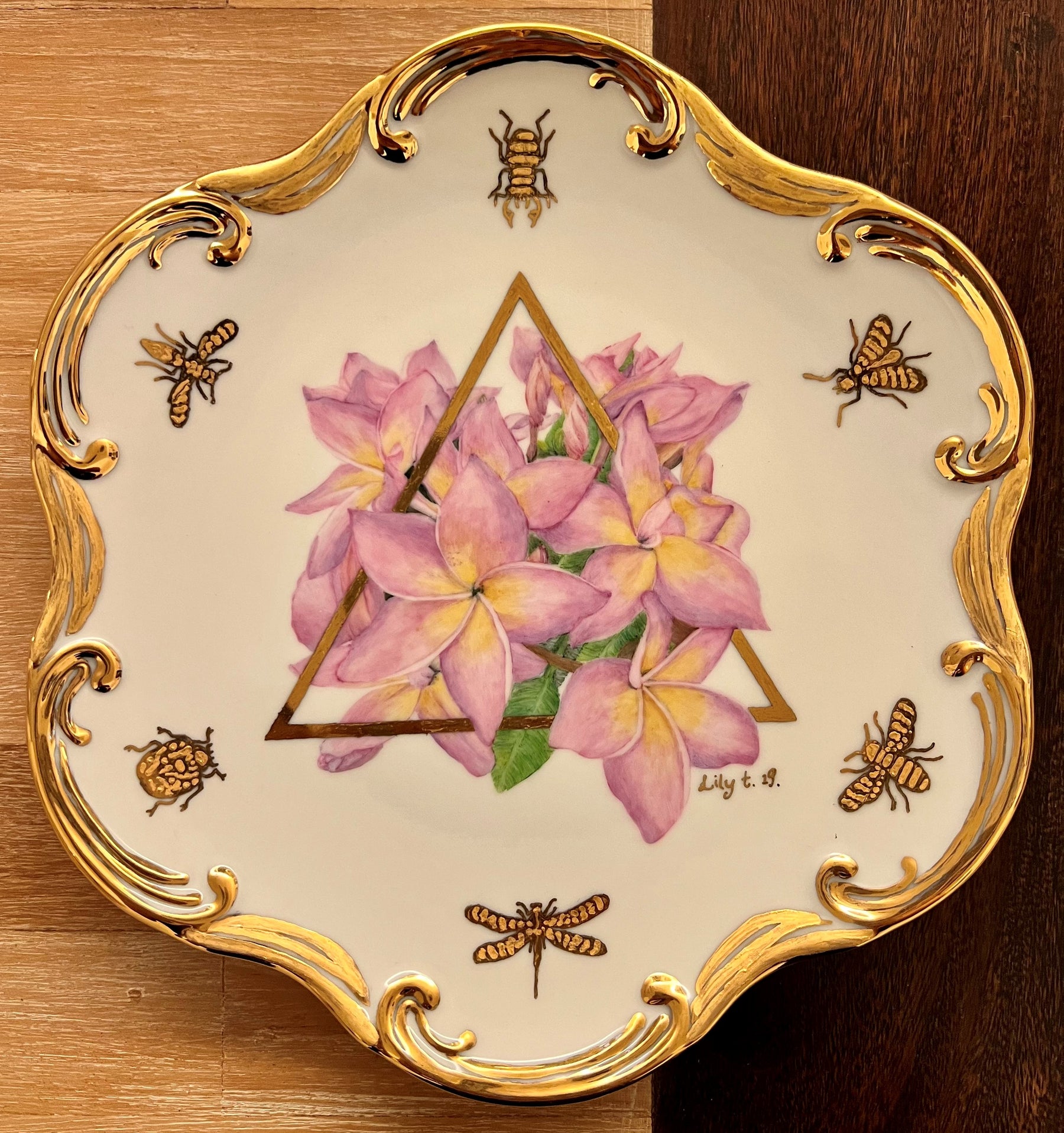 scrolled plate with pink flowers and gold